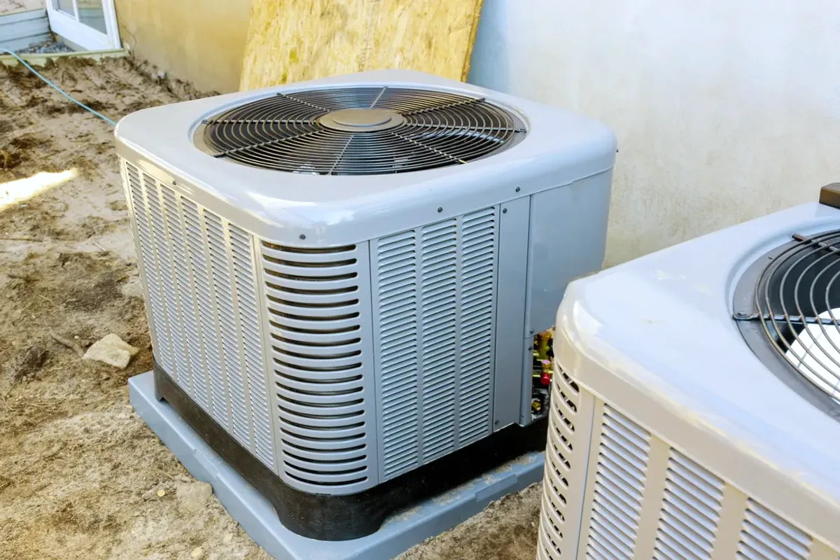 Two outdoor air conditioner condensers